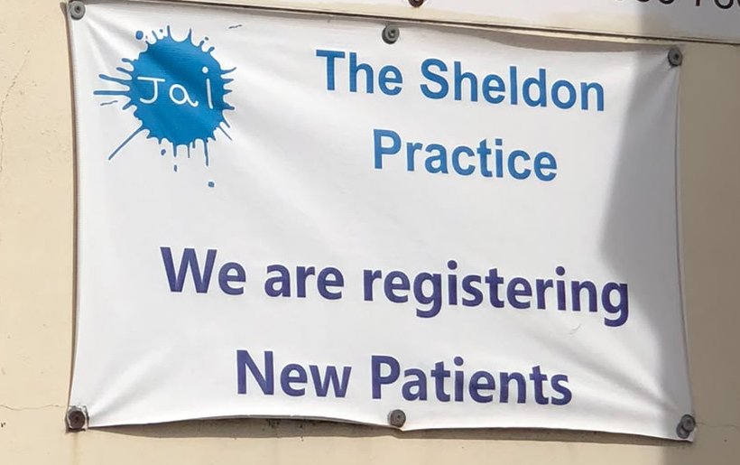 Banner outside a London GP surgery: We are registering new patients